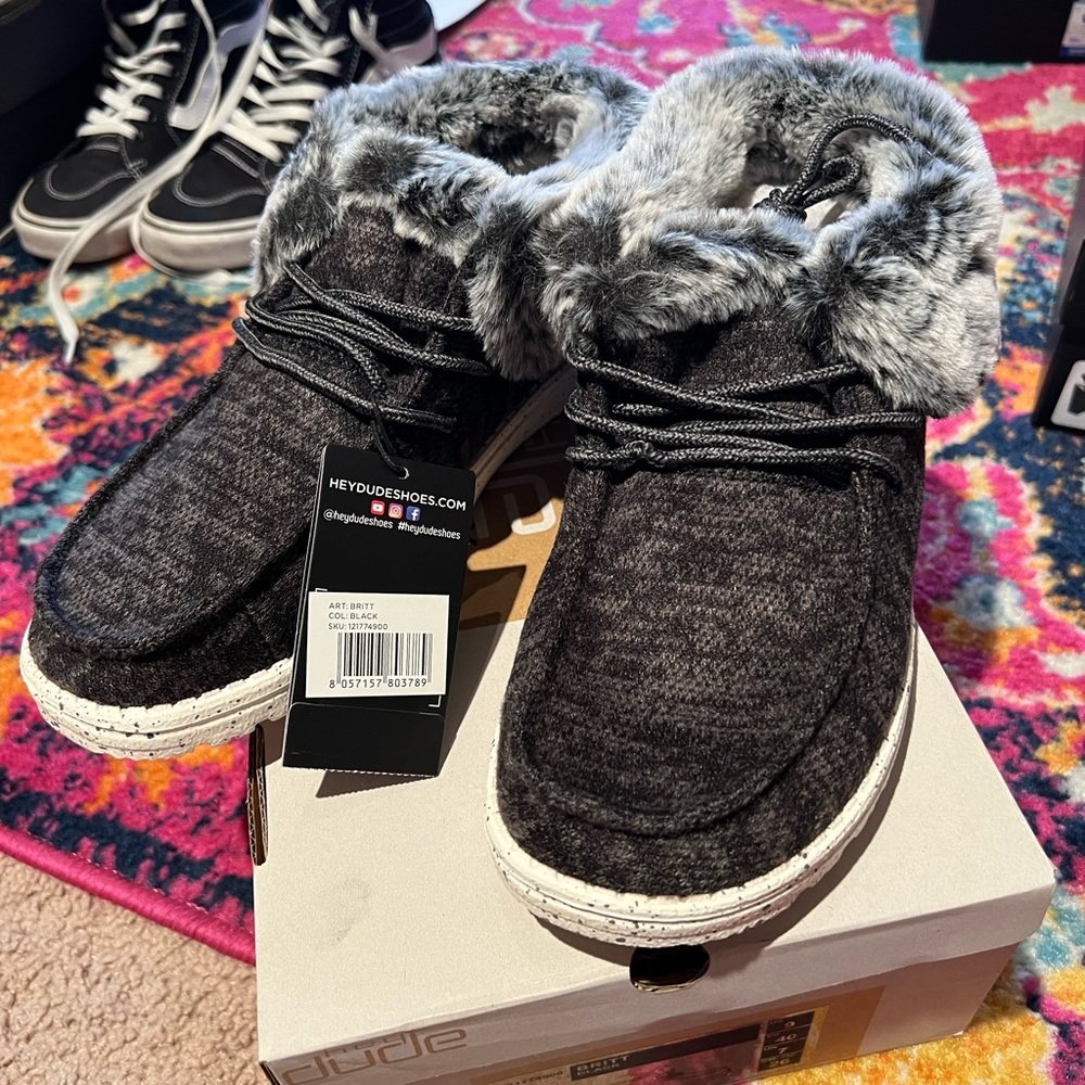 Brand new, never worn in box with tags
